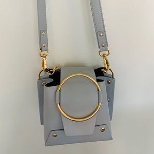 Yuzefi designer crossbody bag—light blue/baby blue